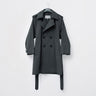 Dark gray textured trench coat on hanger with button front and belt tie