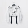 Cropped trench jacket garment on hanger in white with black strap accents and snap buttons