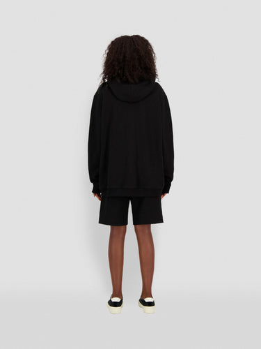 Black hoodie with hood, kangaroo pocket, ribbed cuffs and hem, back view.