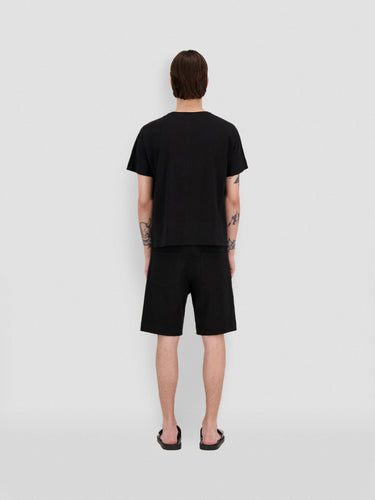 Black jersey T-shirt, back view with crew neck and short sleeves