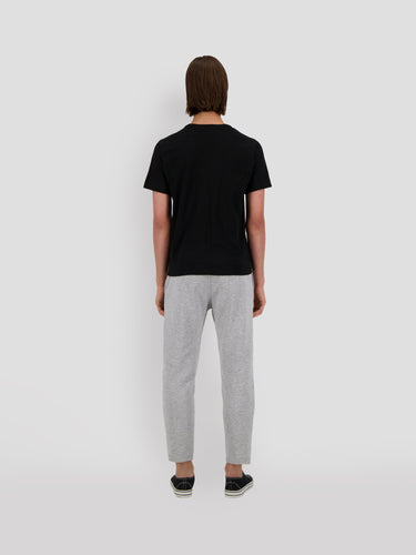Black jersey T-shirt with crew neck and short sleeves, plain back