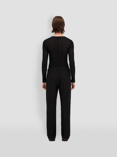 Black straight-leg sweatpants with small 3D Theo logo on back